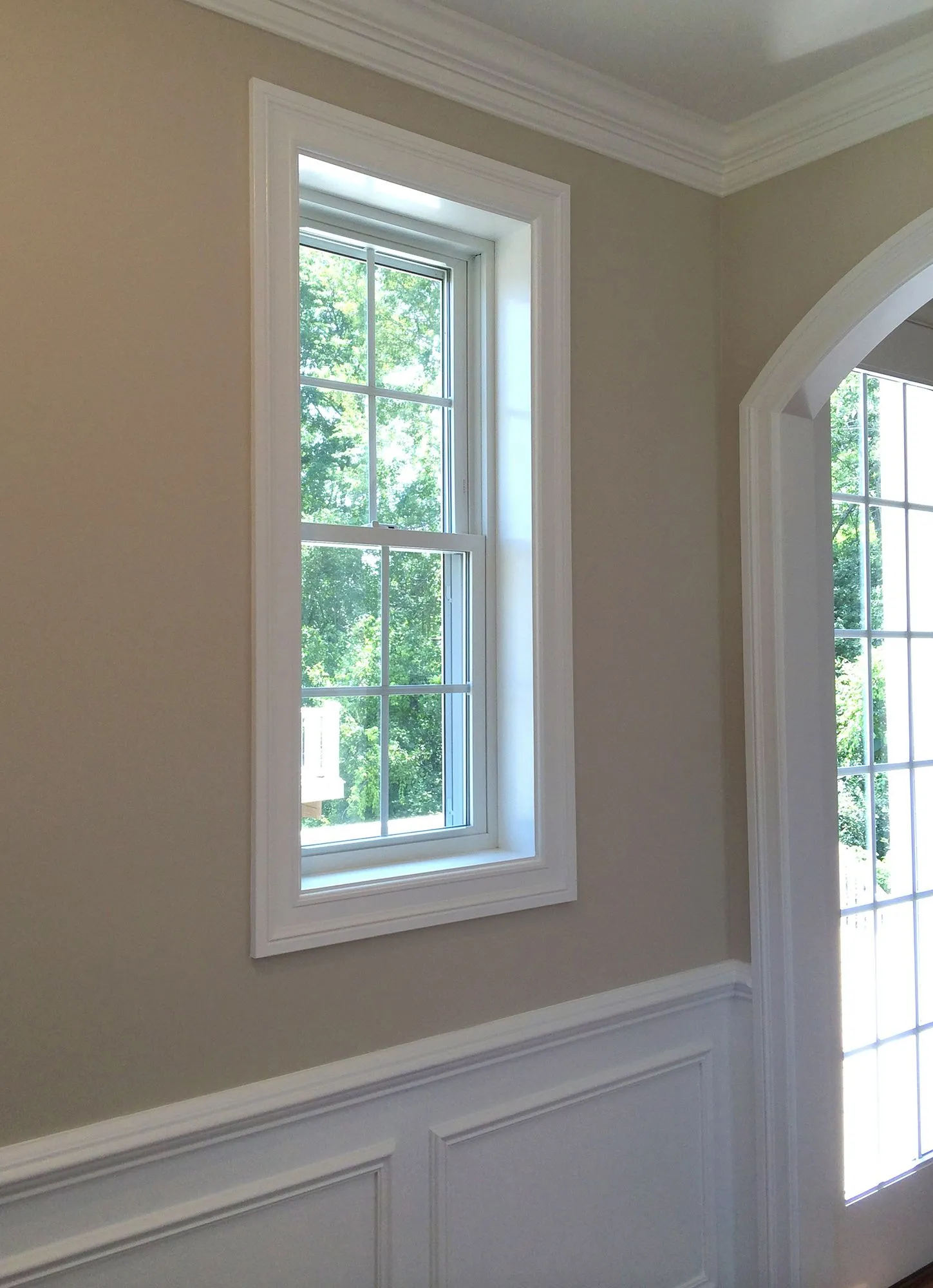 a window in a room with a white trim